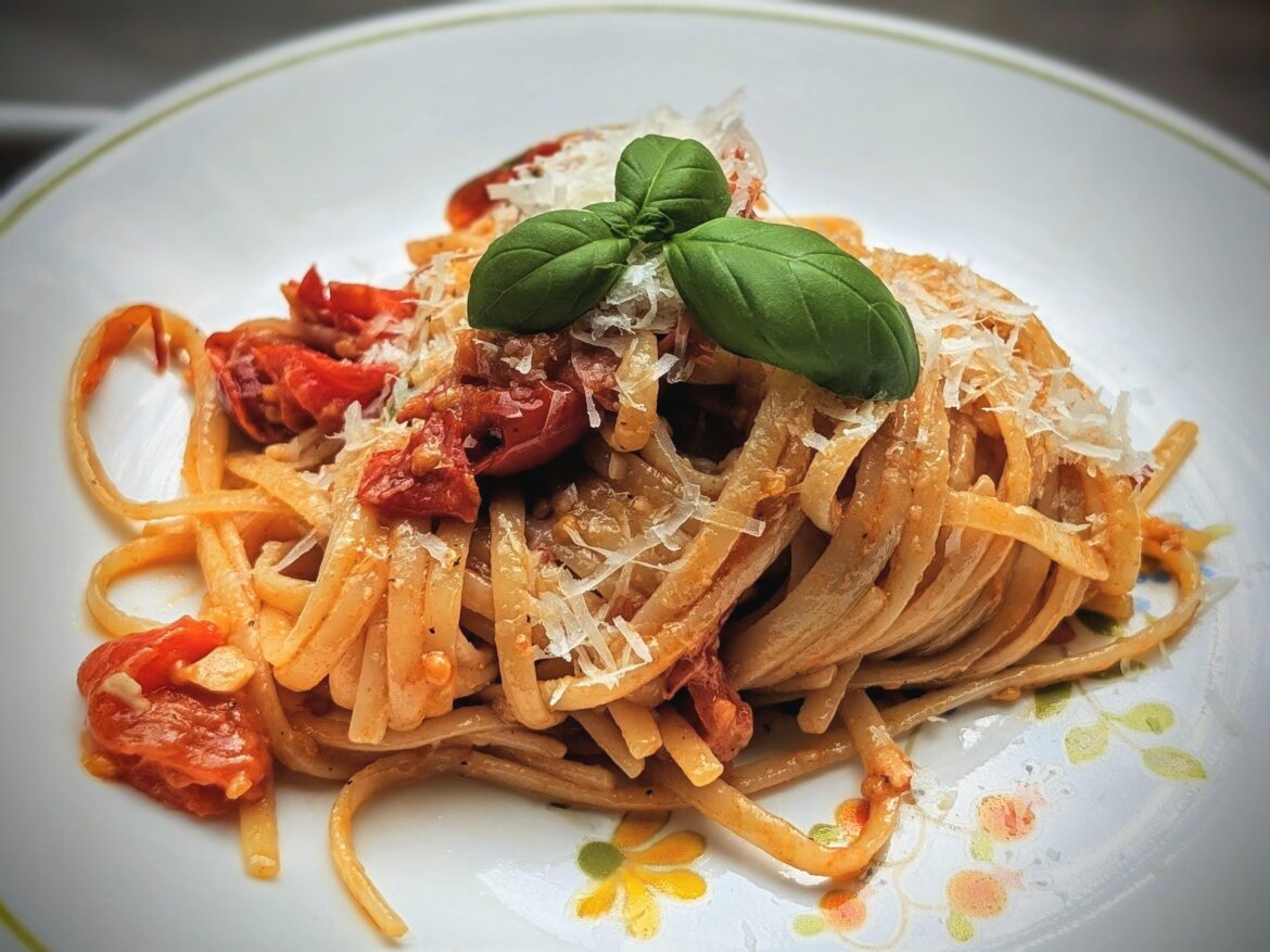 Homegrown tomatoes, basil and garlic. Simple, delicious linguine dish.