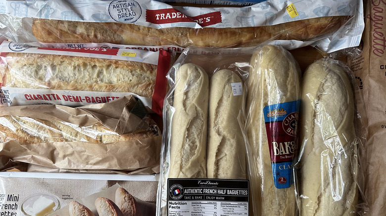 Variety of store-bought baguettes on table