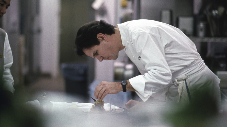 Thomas Keller working in kitchen in 1996