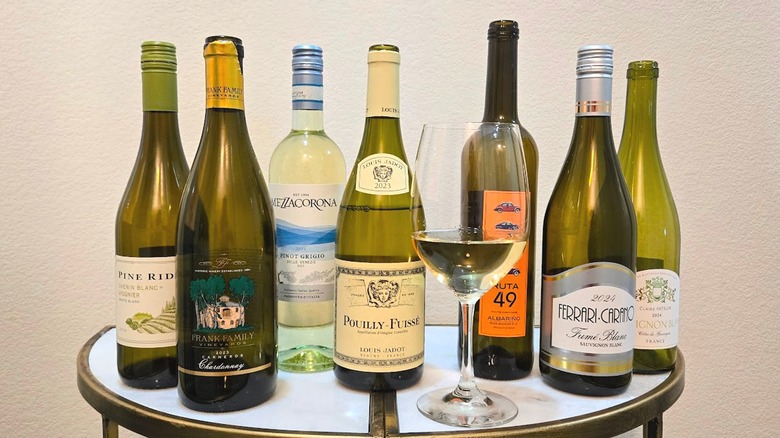 Bottles of white wines available at Trader Joe's with glass