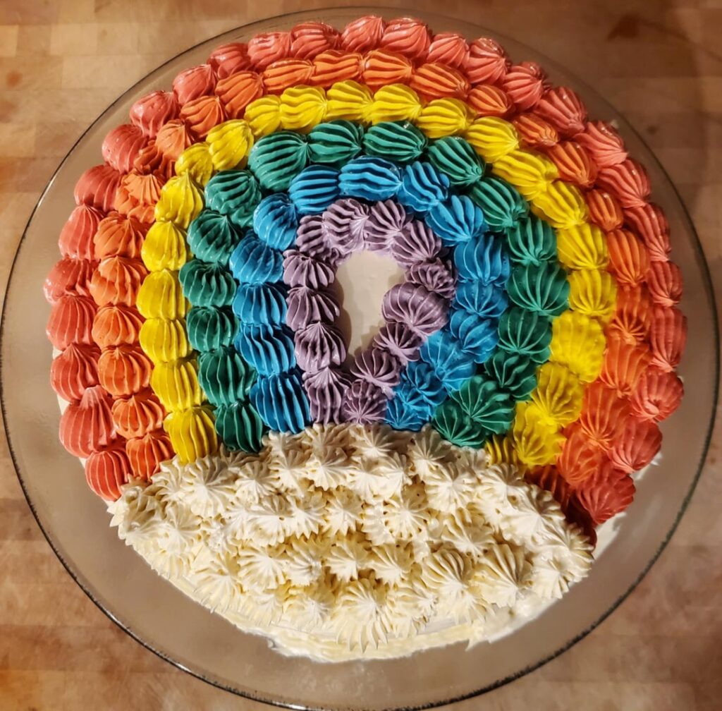 Dad's first try at piping. My 5-y.o. wanted a rainbow, I gave her a rainbow.