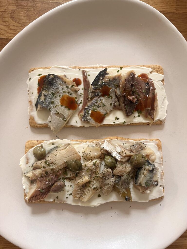 today’s lunch! 🐟 first time trying fishies on crackers! (success) today’s lunch! 🐟 first time trying fishies on crackers! (success)