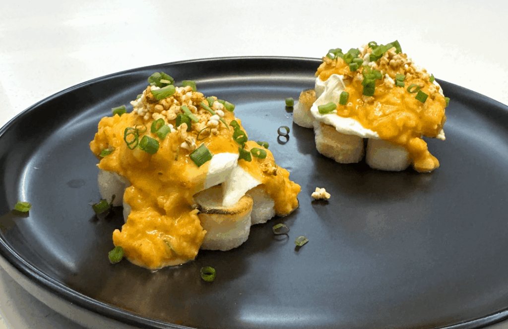 Kimchi Hollandaise Eggs Benedict with Gochugaru-Puffed Rice Crust