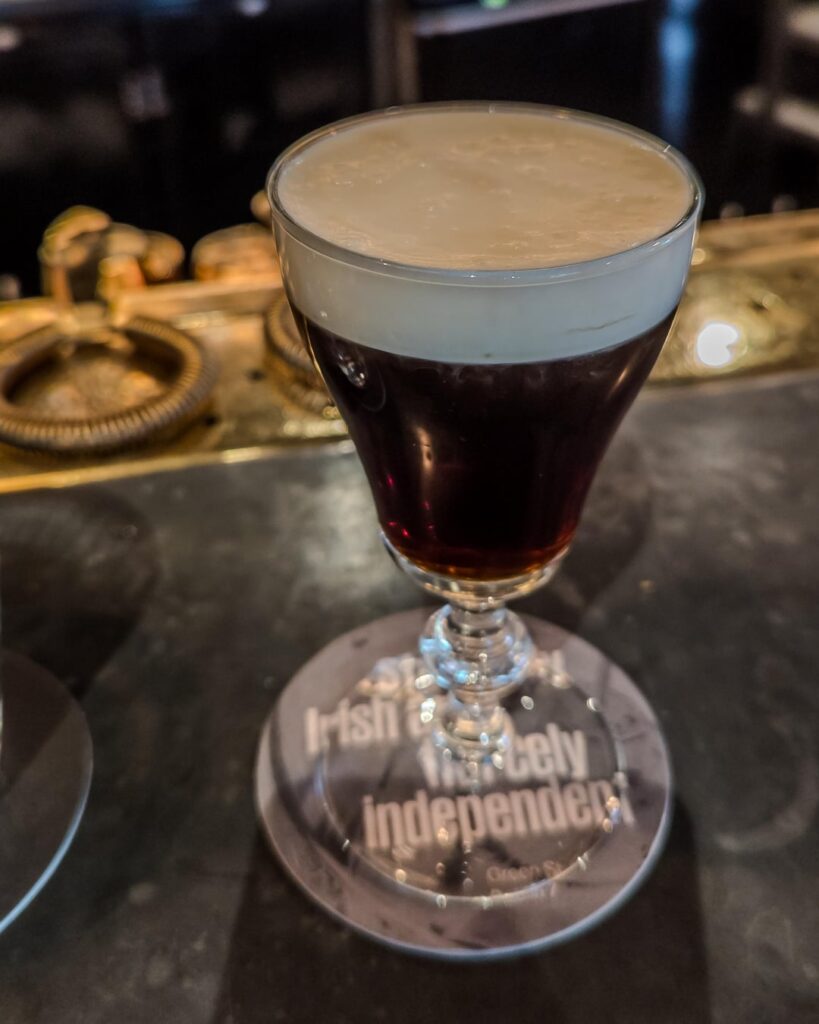 Irish Coffee cocktail, made with Irish whiskey, Irish butter, Guinness, soda bread, cream, and coffee :-)