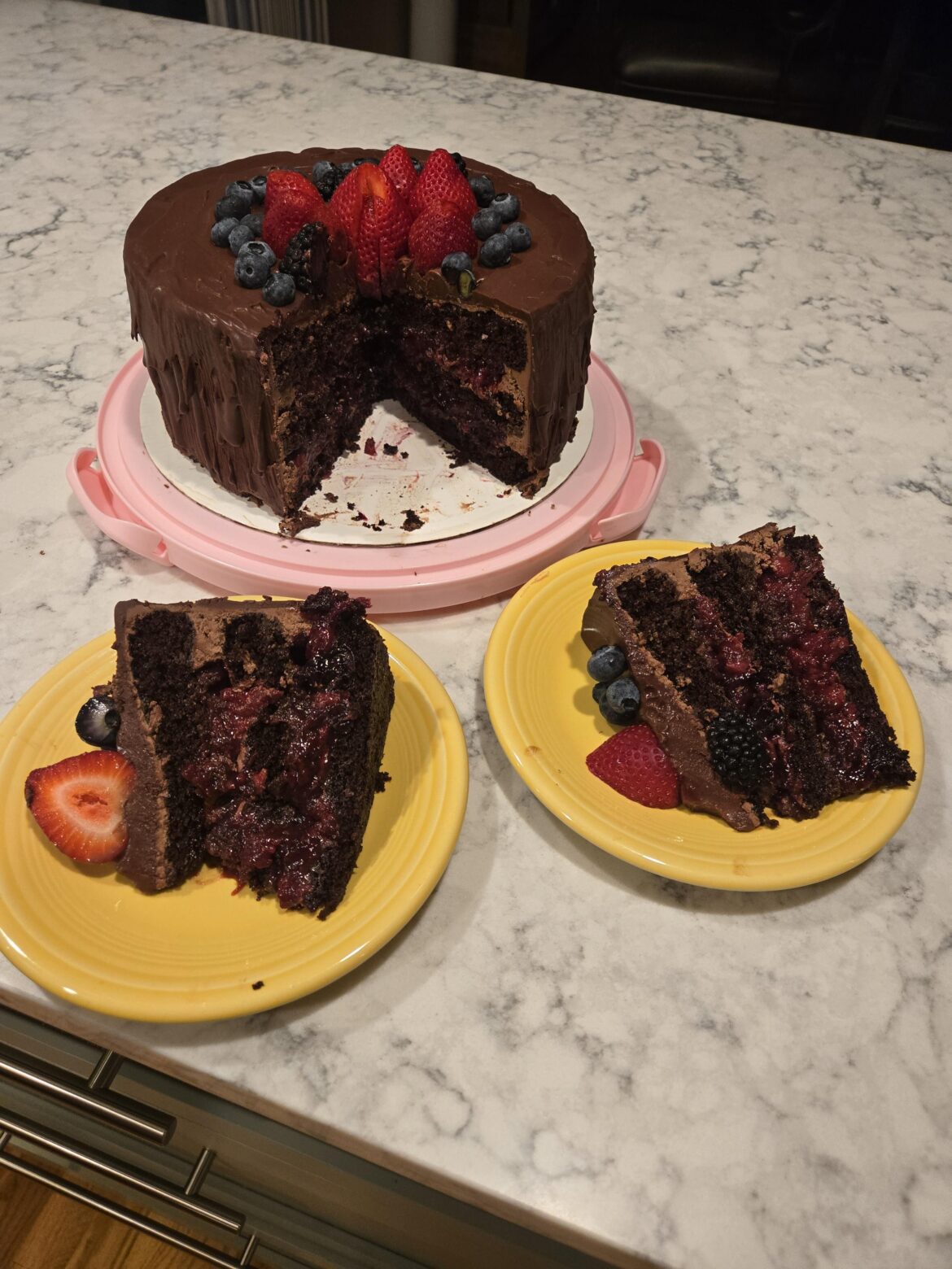 Hubby made chocolate cake with triple berry filling