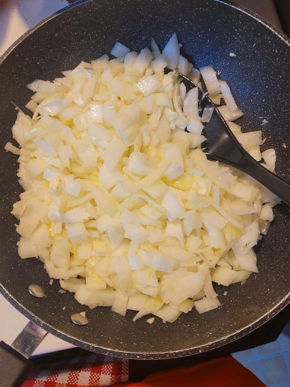 One biiiig, locally grown, sweet onion for spaghetti