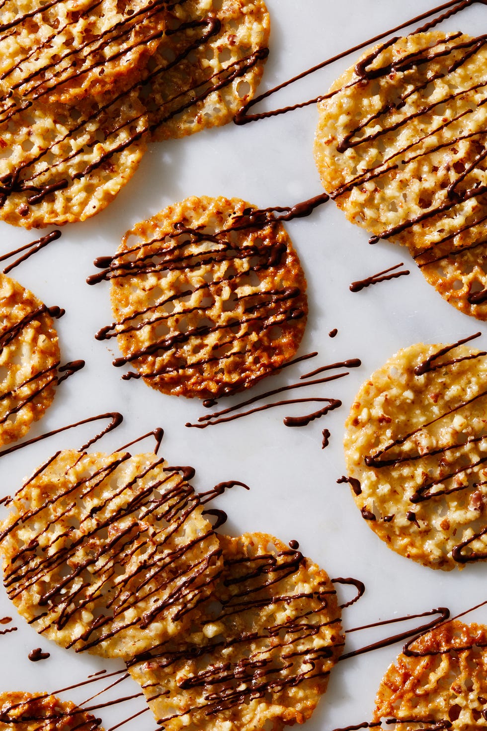 golden lace cookie drizzled with chocolate