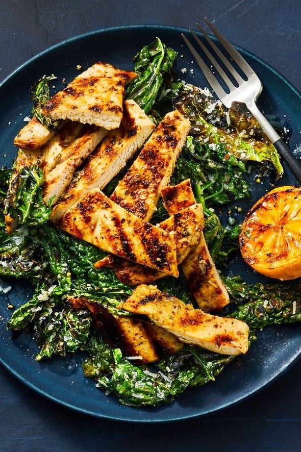 grilled lemony chicken and kale on a plate