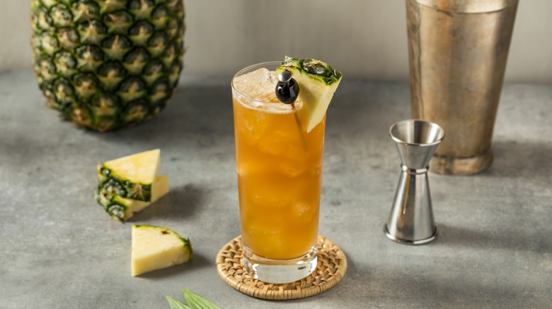 Bahama Mama cocktail with pineapple and cocktail shaker