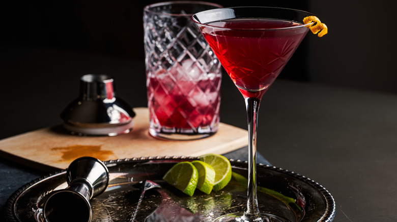 Cosmopolitan in martini glass on silver tray