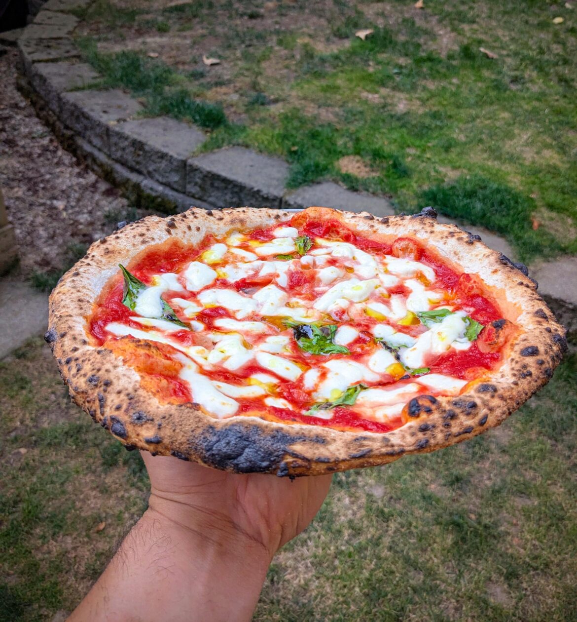 Margherita baked in my wood fired Oven. 35 second bake.
