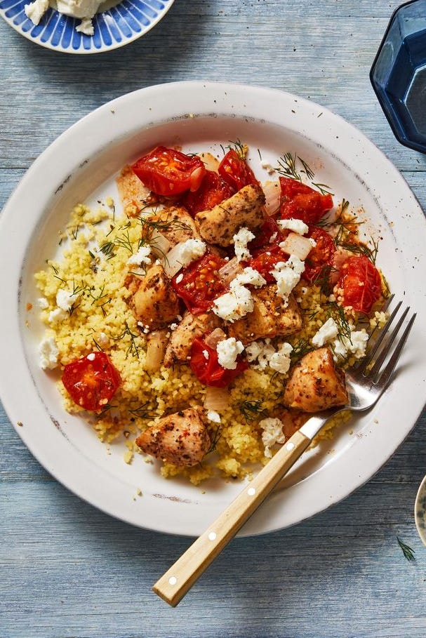 mediterranean chicken bowls with roasted tomatoes and couscous