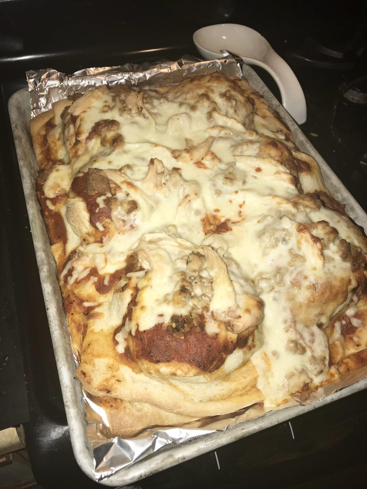 Cheeseburger stuffed pizza