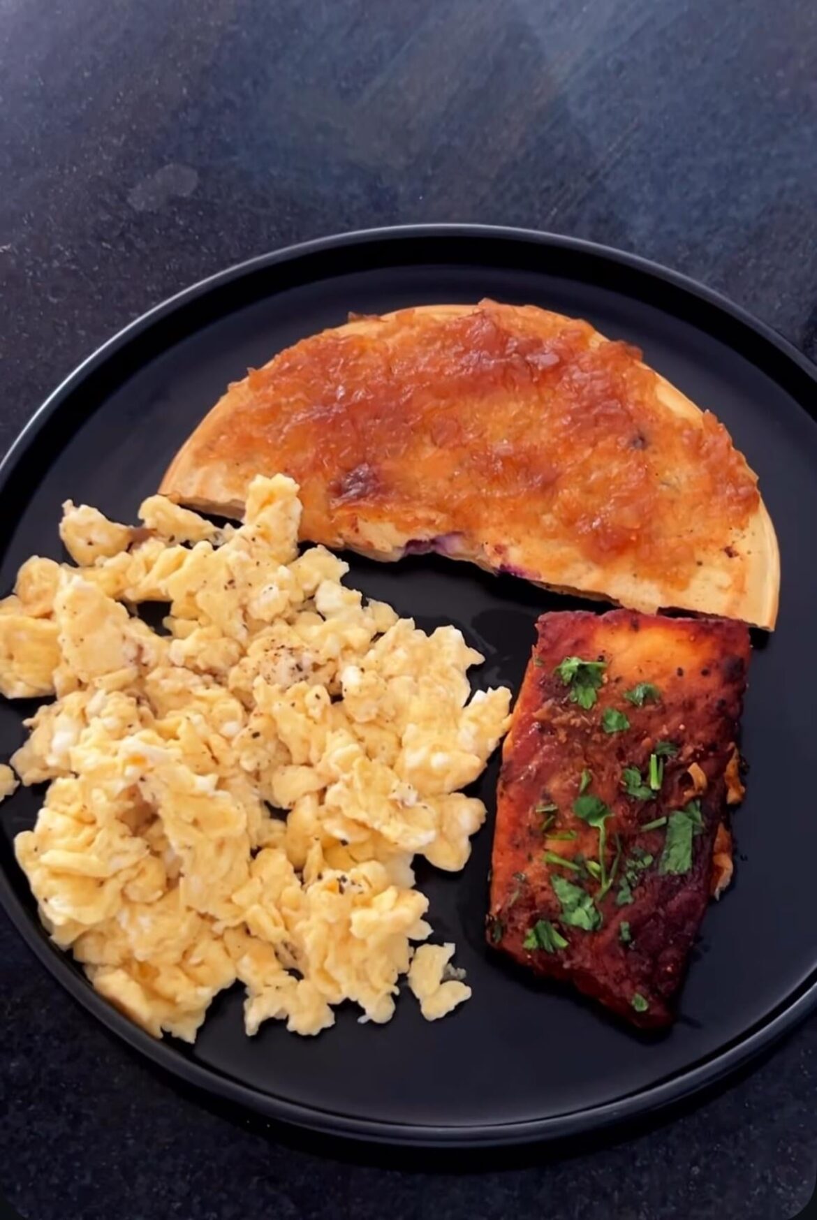 Scrambled eggs, salmon and pancake