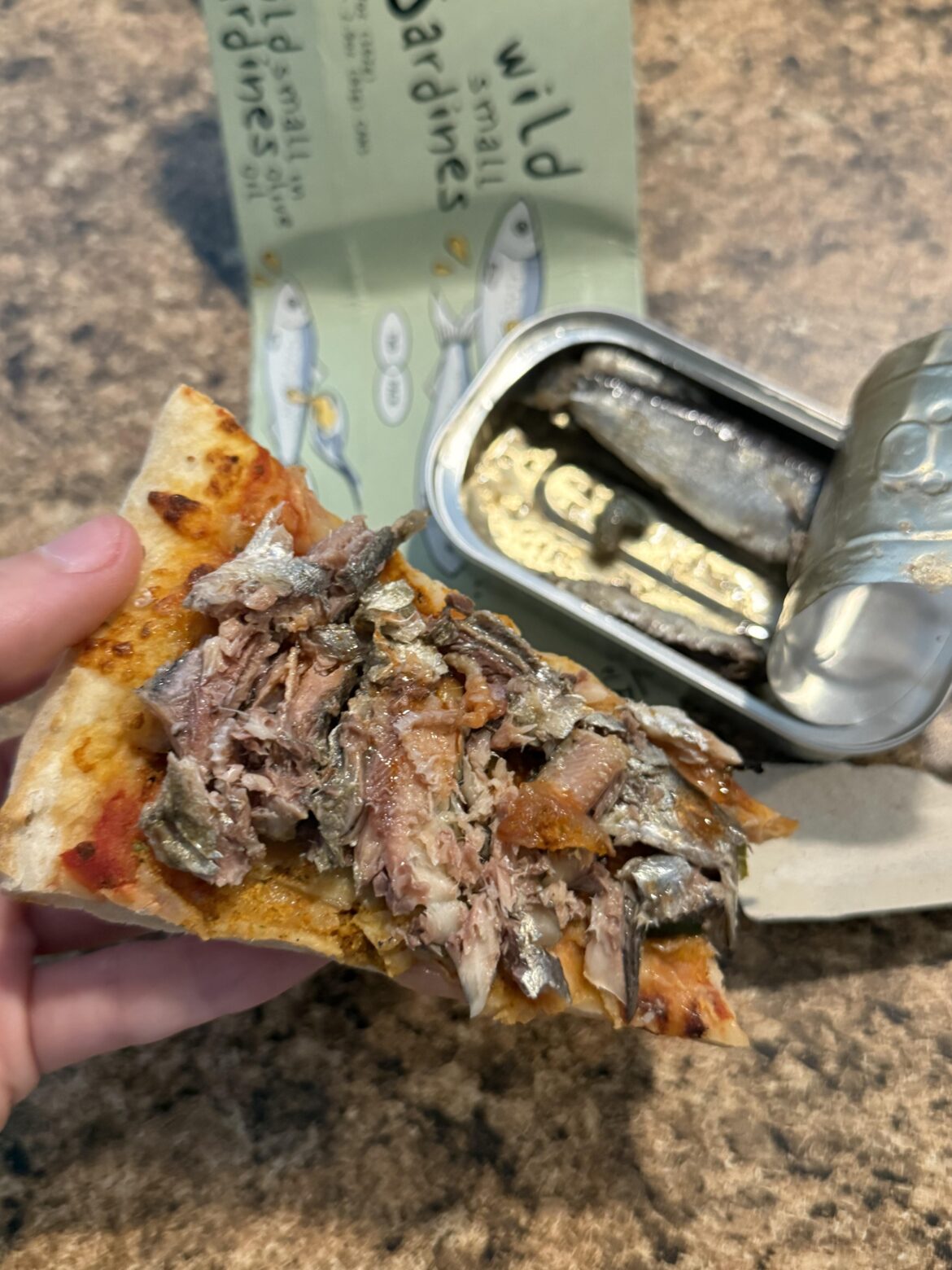 Am I a criminal for this? Using leftover cold pizza as a cracker for my sardines Am I a criminal for this? Using leftover cold pizza as a cracker for my sardines