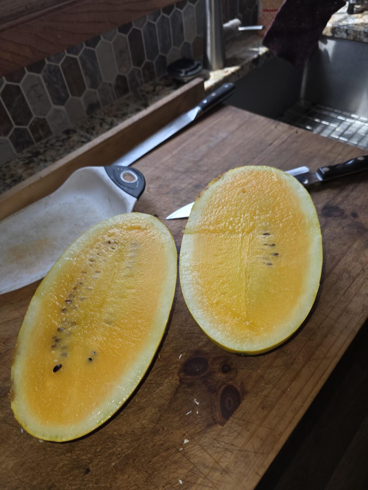 My first ripe watermelon ever off the vine!😃 Gold in gold 4b