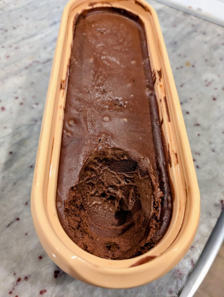 Dark chocolate ice cream with blood orange marmalade swirl