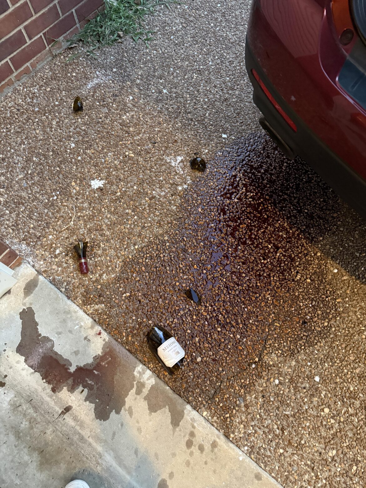 Casualty of war (I accidentally dropped a bottle Meiomi on my driveway)