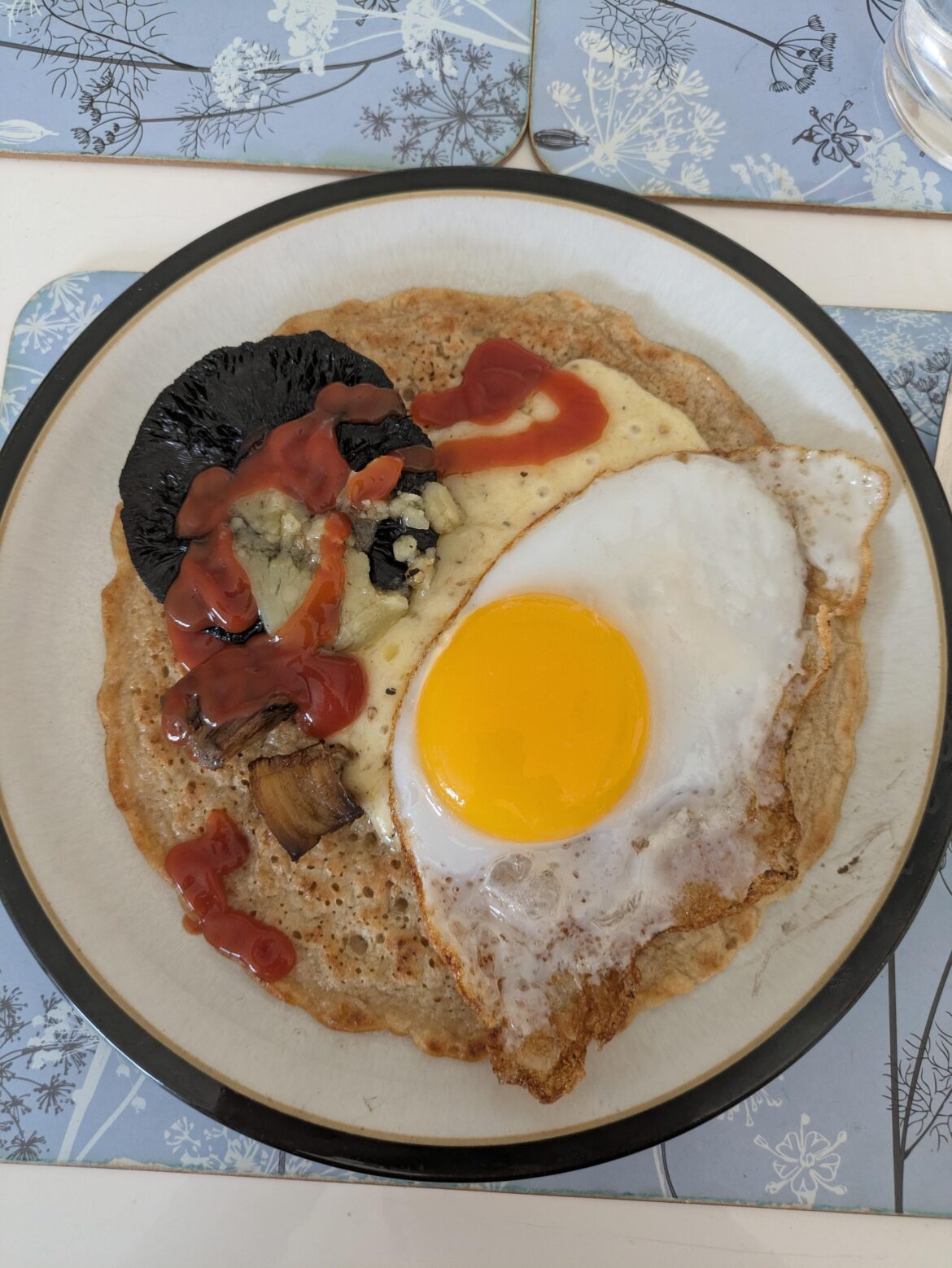 Derbyshire oatcake, duck egg, mushroom, and black pepper cheese 👍