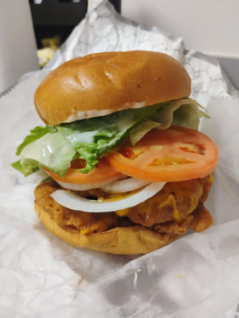 Crispy chicken breast with, melted yellow American, LTO and Bleu cheese dressing. Crispy chicken breast with, melted yellow American, LTO and Bleu cheese dressing.