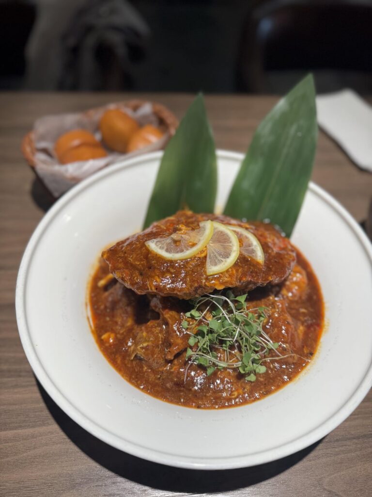 Singaporean chilli crab and shiso spicy clams at I’m a Little Hot Crab in Toronto