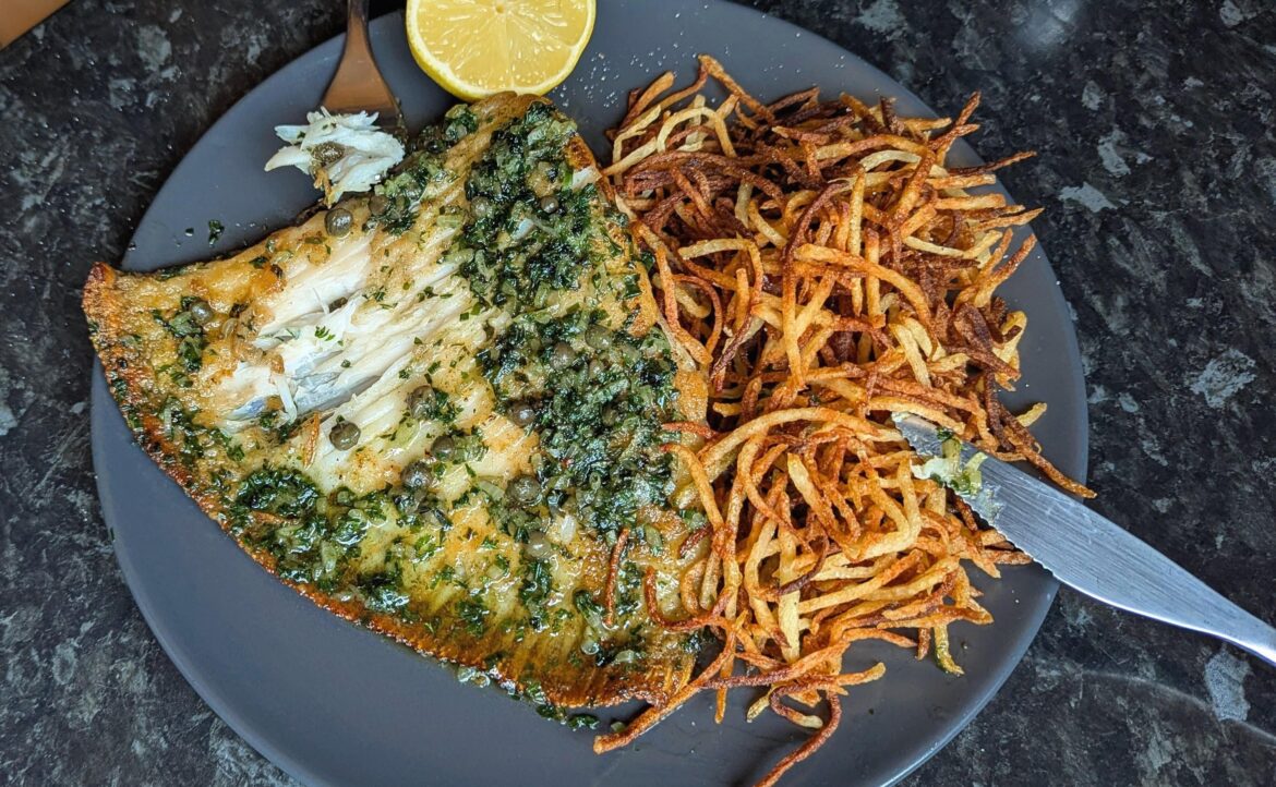 Skate, shoestring fries, wild garlic and herb butter