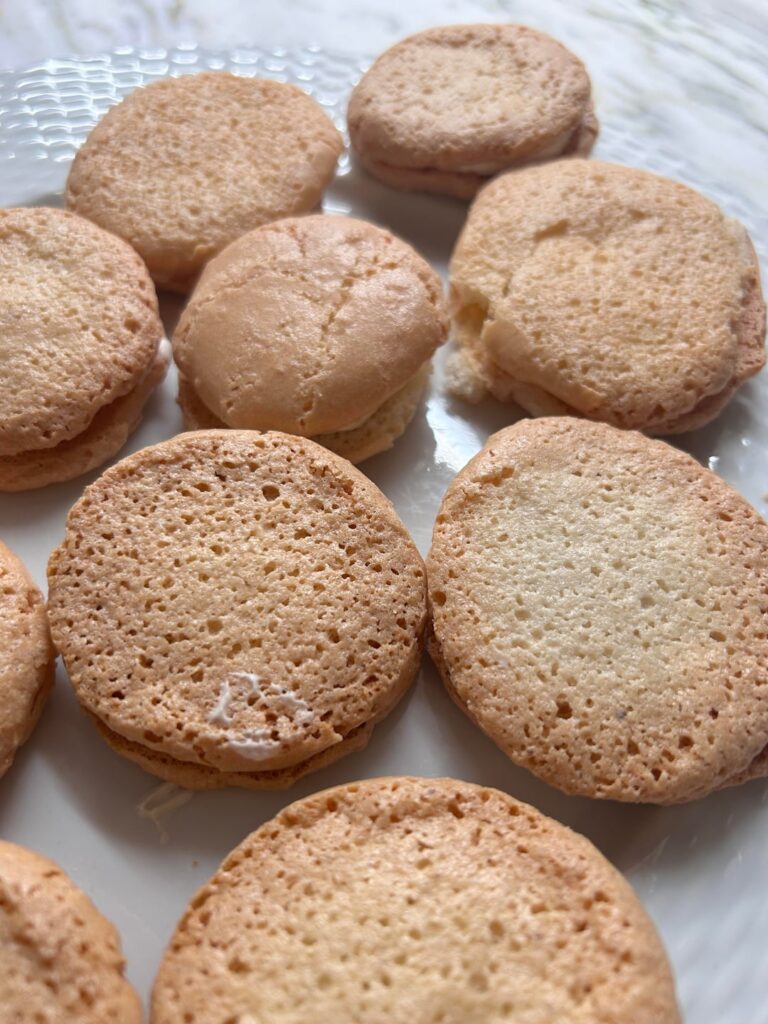 These are supposed to be vanilla macarons. What did I do wrong? These are supposed to be vanilla macarons. What did I do wrong?