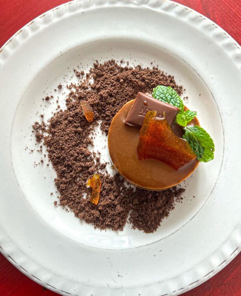 Arabica coffee mousse cake with sea-salt chocolate sauce and caramelised sugar shards.