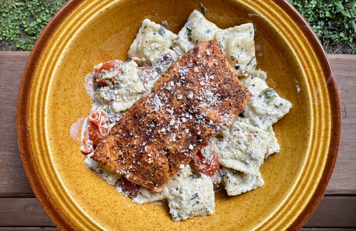 Coho with four cheese mini ravioli primavera in creamy herb sauce (oc)