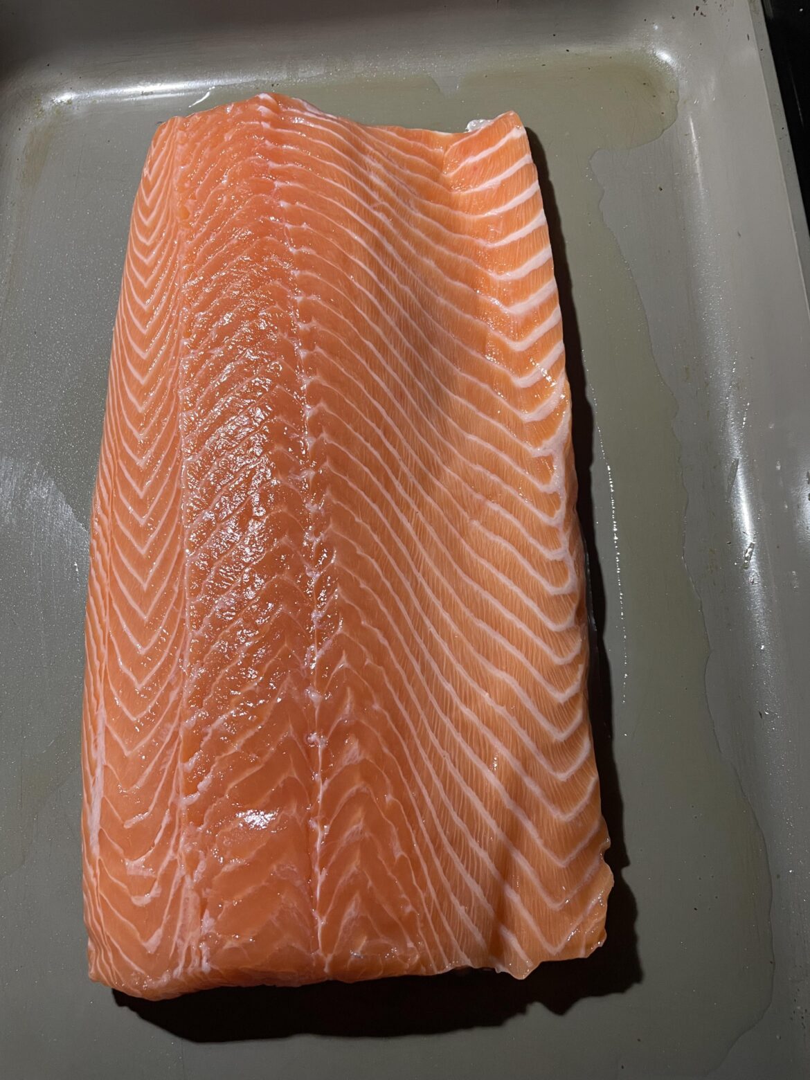 This beautiful cut of salmon my dad got me while he was at work