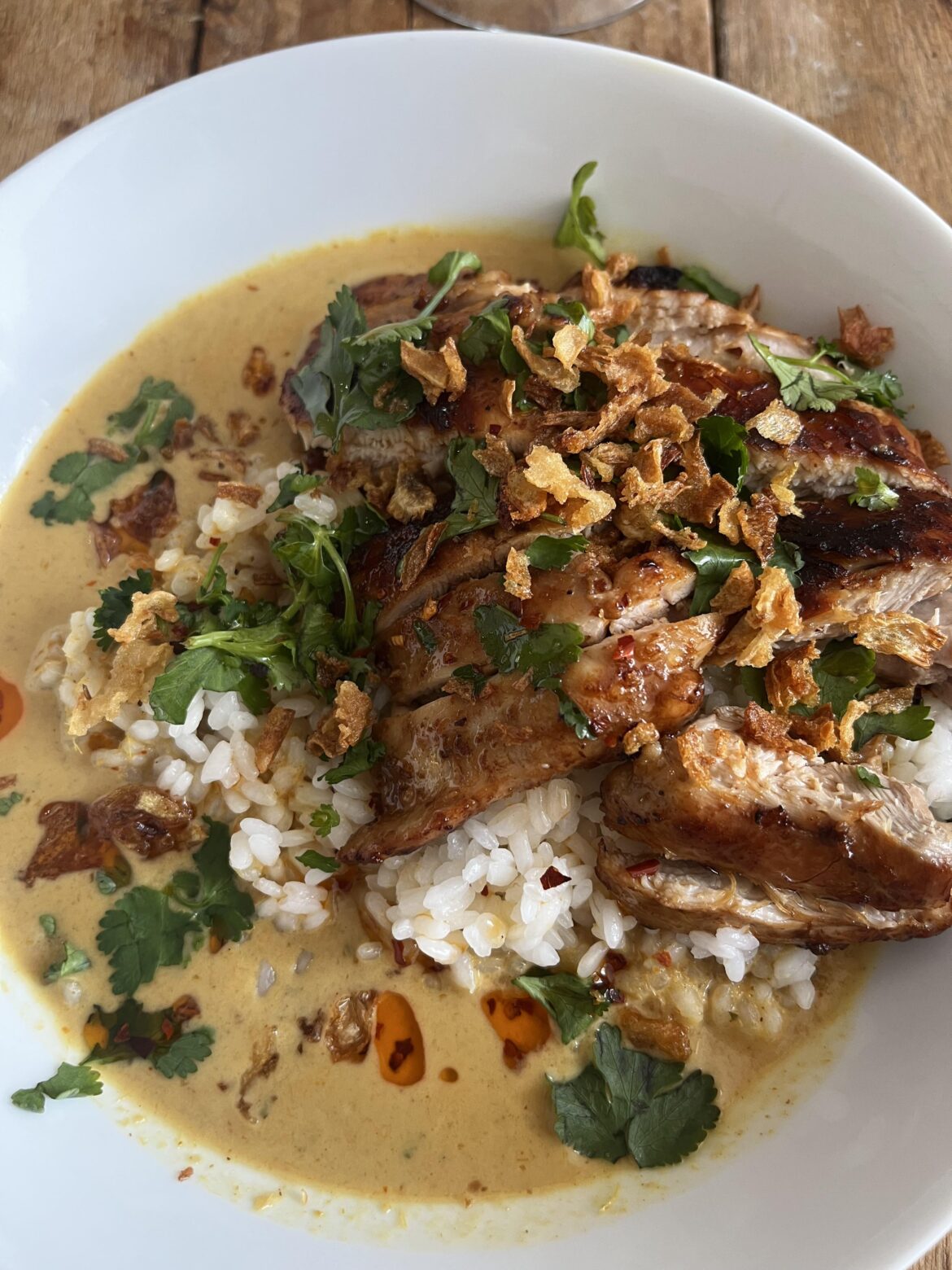 chicken thighs & rice with yellow Thai coconut broth