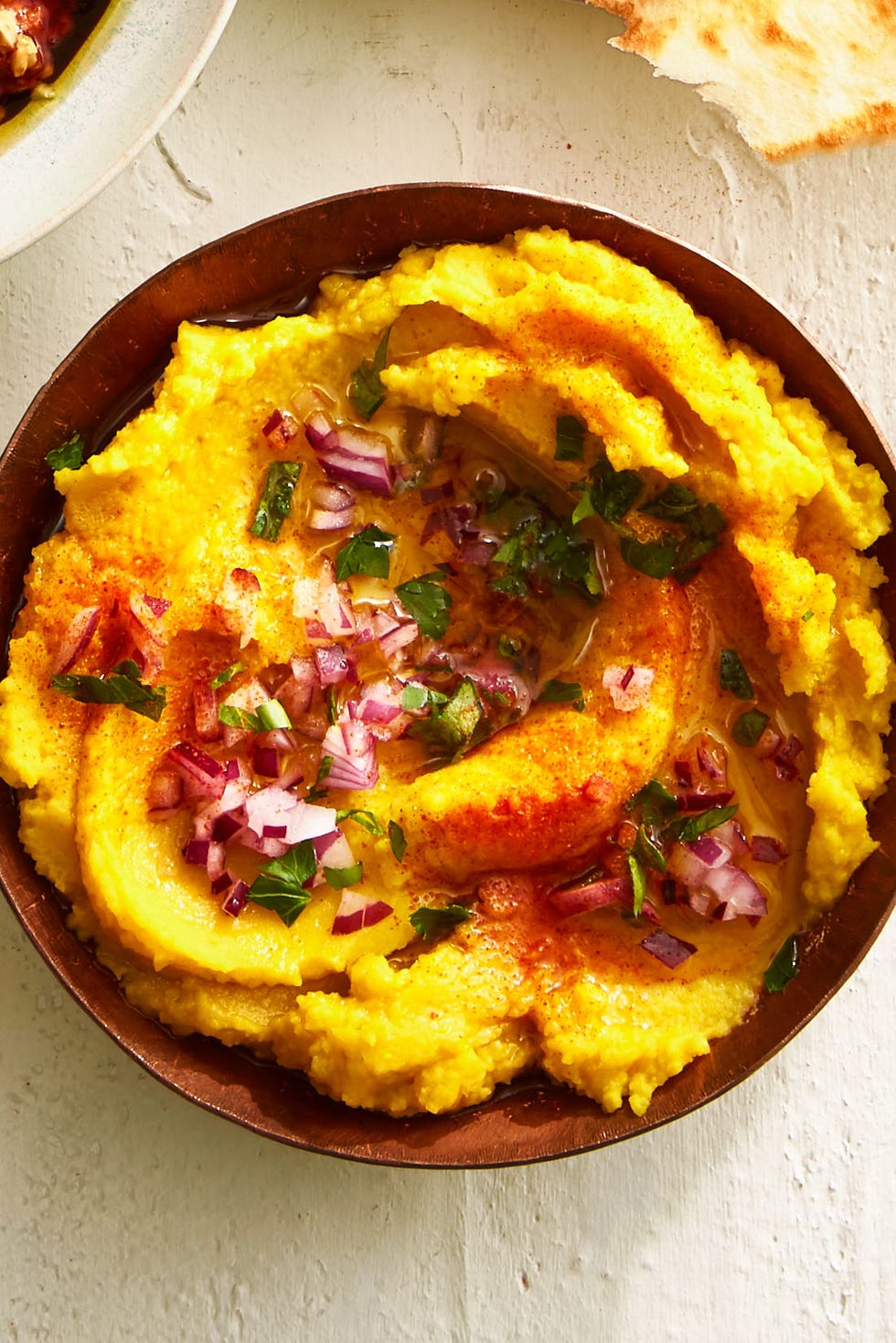 yellow split pea dip in a bowl