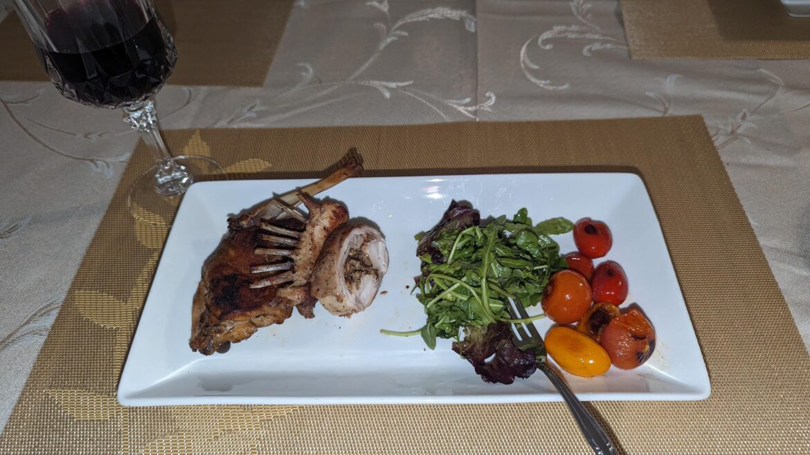 Rabbit 3 ways - Confit Legs/Hind Quarters, Saddle + Duxelle Stuffing, Frenched Ribs with Mixed Arugula Greens and Blistered Cherry Tomatoes