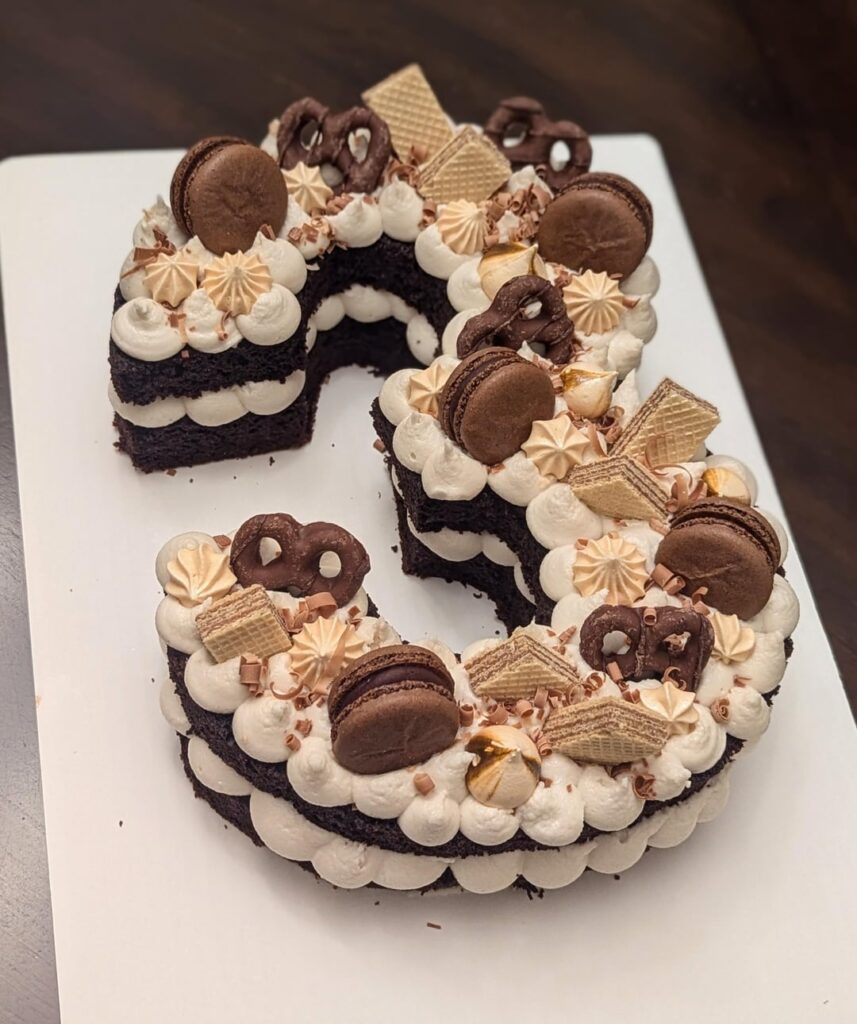 Which frosting looks better with the toppings? Trial run for my best friend's 30th birthday cake 😊