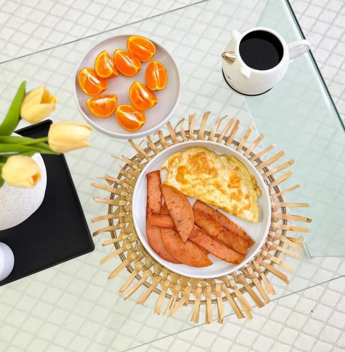 Good morning ! Eggs, Spam, orange slices and a cup of black coffee.