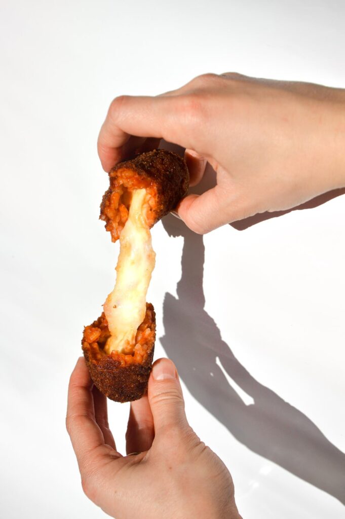 Supplì - fried tomato rice balls stuffed with mozzarella 🍅