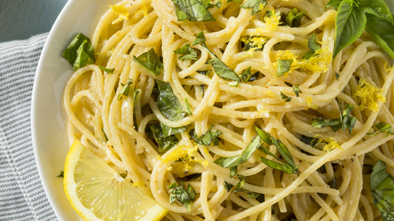 bowl of lemon spaghetti with basil