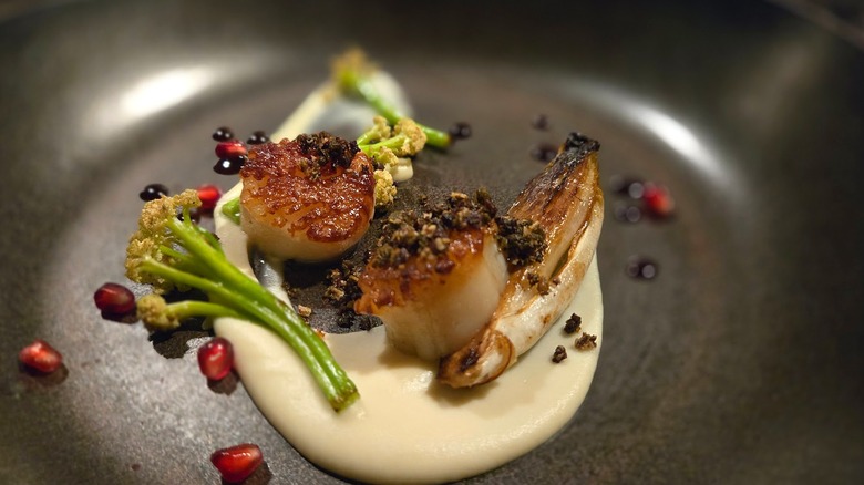Seared scallops with leaks and pomegranate