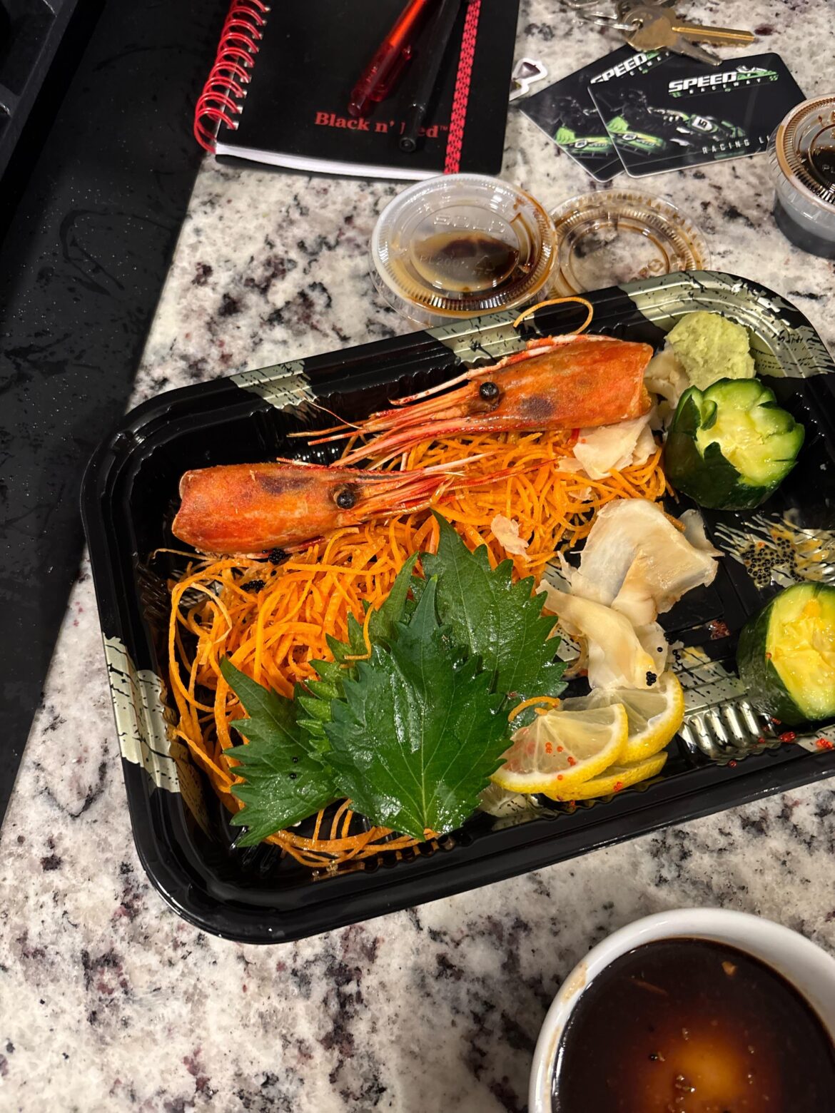 What is the proper Japanese way to eat shrimp heads like in the picture below?