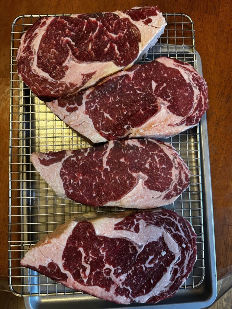 Charcoal grilled ribeyes Charcoal grilled ribeyes