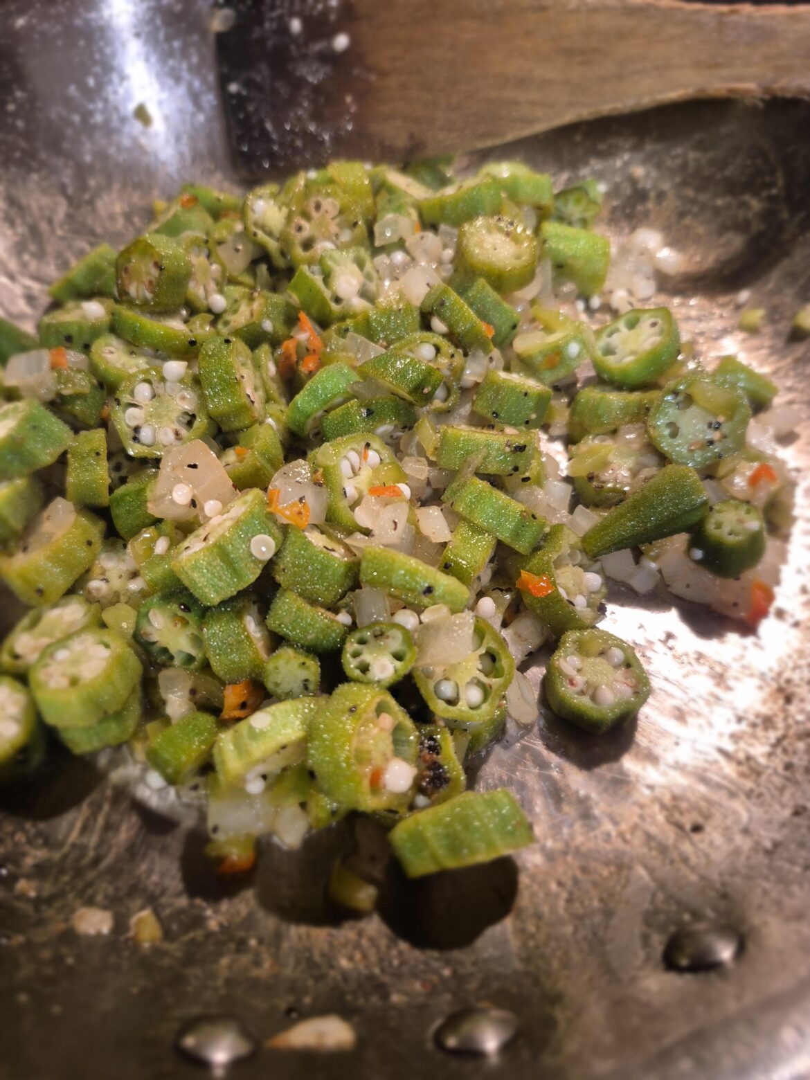 I grew ghost peppers and okra this summer. Thought they go good together. I was right.