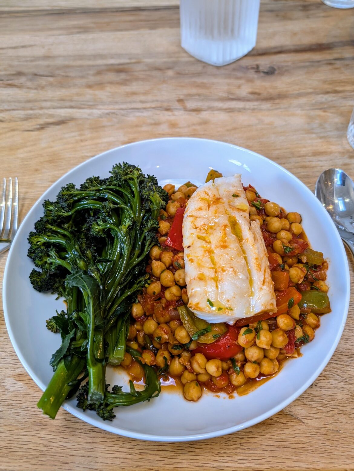 Spanish chickpeas and cod with purple sprouting broccoli