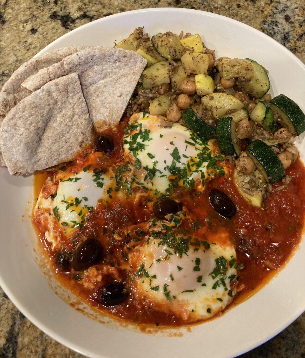 Lazy shakshuka for dinner with za’atar sautéed veggies and pita bread
