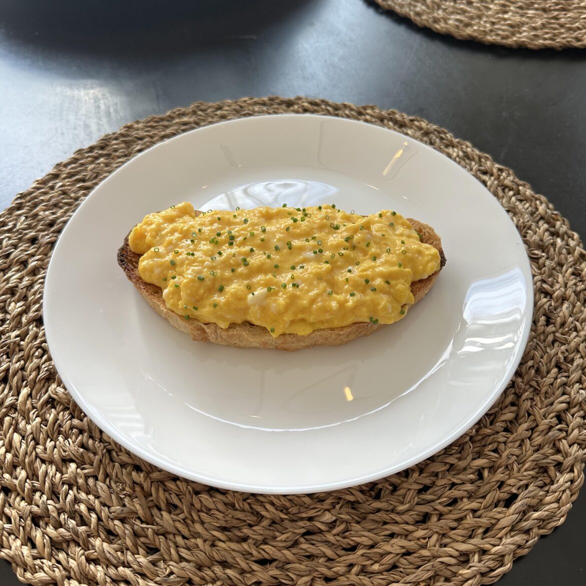 Scrambled eggs on homemade bread with CHIVES