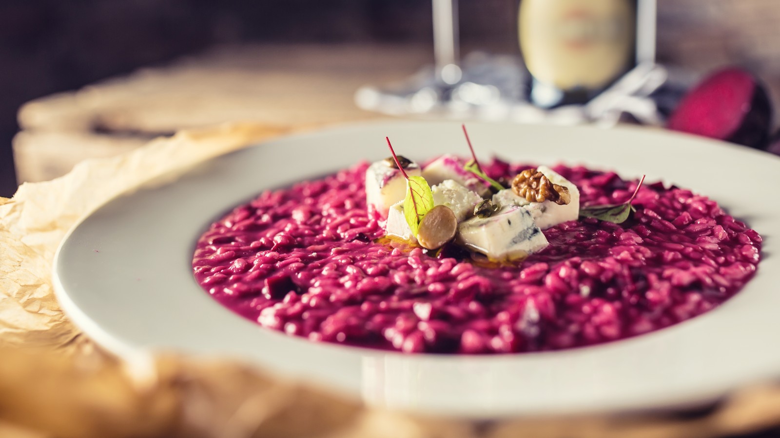 traditional italian dish of Risotto al Barolo on a restaurant table
