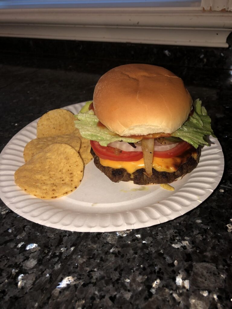 Cheeseburger with grilled onions and grilled Jalapeños Cheeseburger with grilled onions and grilled Jalapeños