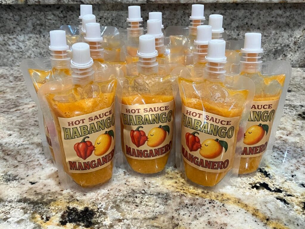 First fruity hot sauce. Turned out well! Habaneros and mangoes were made for each other. 🤤