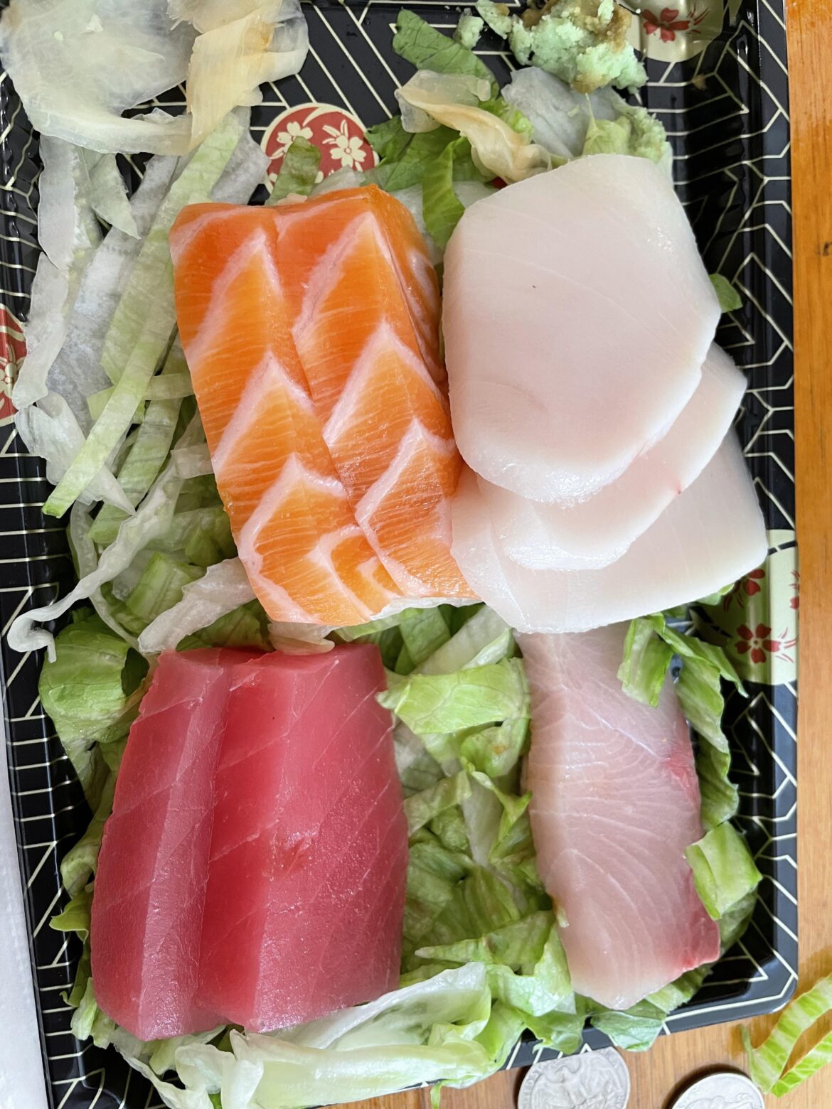 What is the fish at the top right?