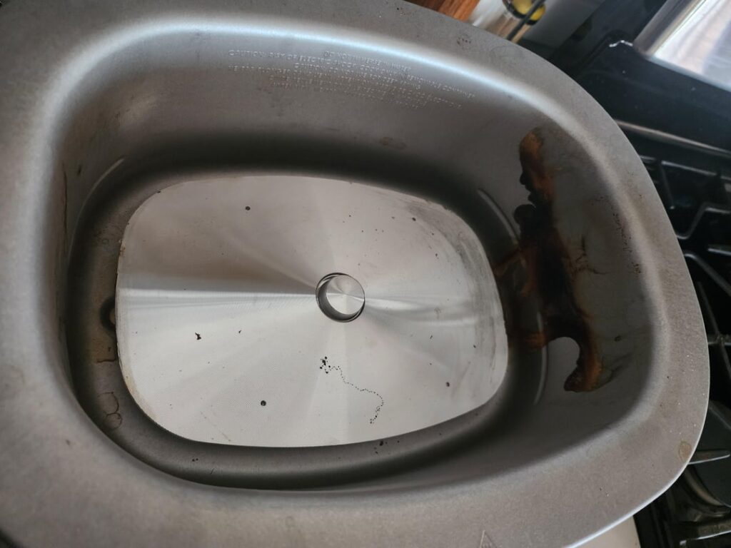 Does anyone know how I should clean this without ruining the whole thing?