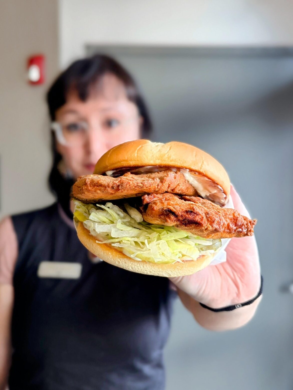 Buttermilk brined fried chicken tenderloin with garlic mayo, dill pickles and lettuce on toasted brioche.